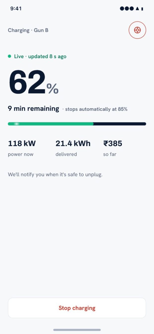 evLane app — live charging session with percentage, time remaining, power and cost